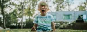 child playing on grass